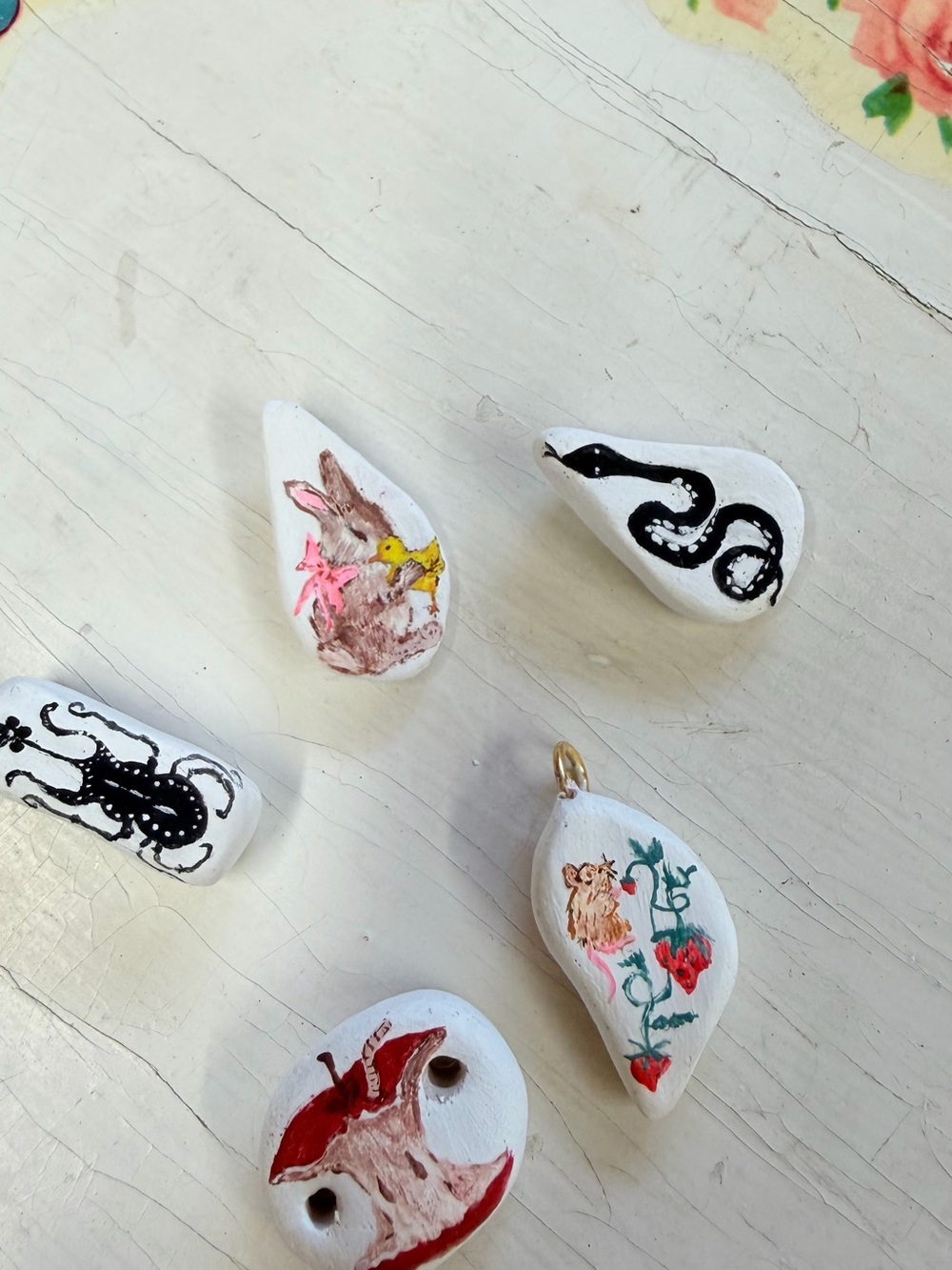 Tiny Hand-Painted and hand crafted Ceramic Pendants